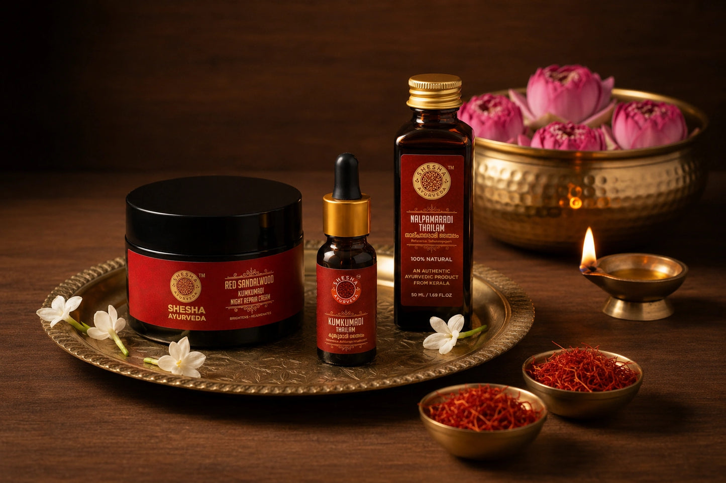 Shesha Ayurveda Night Goddess Kit flat lay with brass diyas, rose petals and saffron