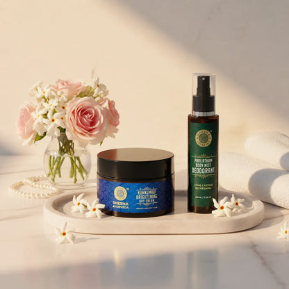 Shesha Ayurveda Glow & Stay Fresh Kit on marble vanity tray with roses, pearls and golden morning light